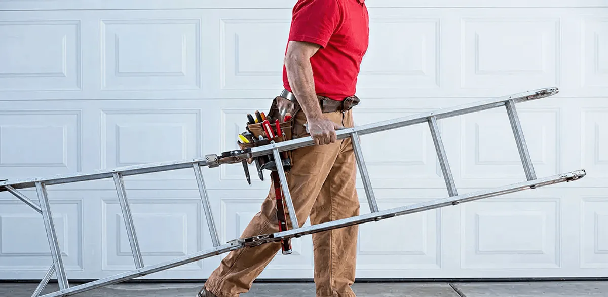 Garage door repair technician arriving with tools and ladder in Anaheim, CA